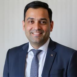 Professional headshot of Omar Hassan
